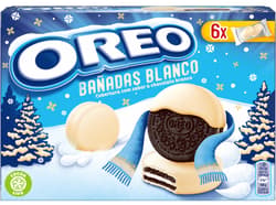 Oreo vaníliaízű töltelékkel töltött kakaós keksz fehér bevonómasszával mártva