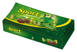 Sport milk chocolate bacon candy with dark chocolate and rum-flavored filling
