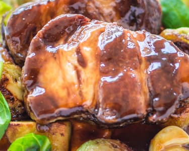 Sous vide pork collar with pumpkin, Brussels sprouts, and gravy