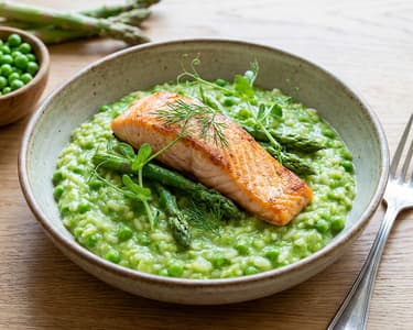 Green pea risotto with salmon and asparagus