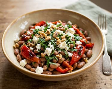 Middle Eastern warm roasted pinto bean salad with roasted kapia peppers and walnuts