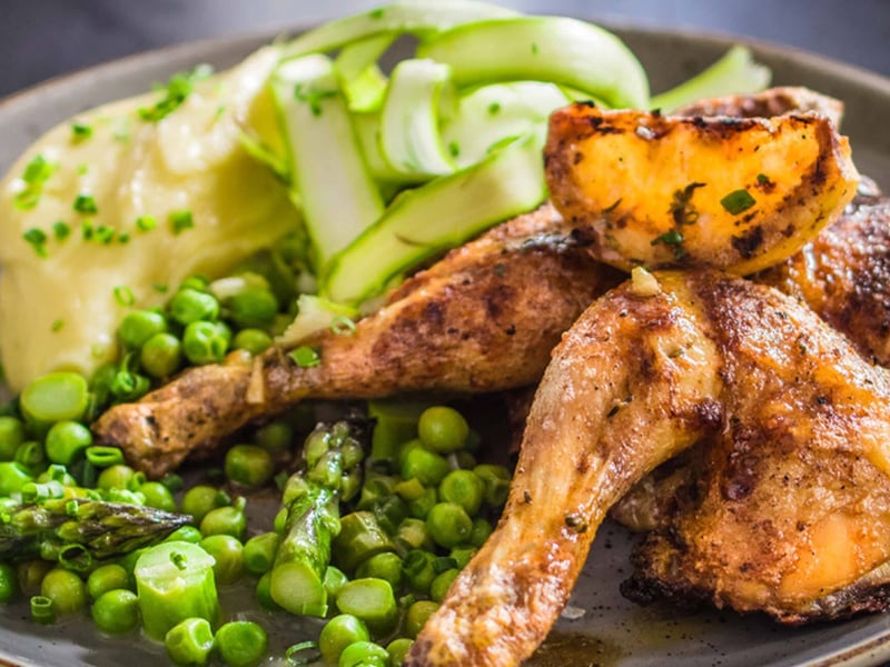 BBQ baby chicken with peas, asparagus and mashed potatoes