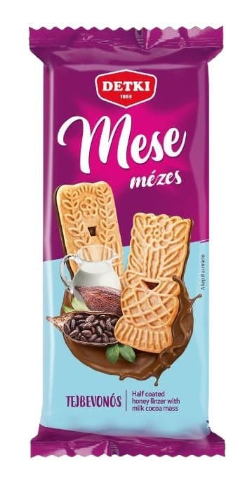 Fairy tale honey linzer half-dipped with cocoa milk coating