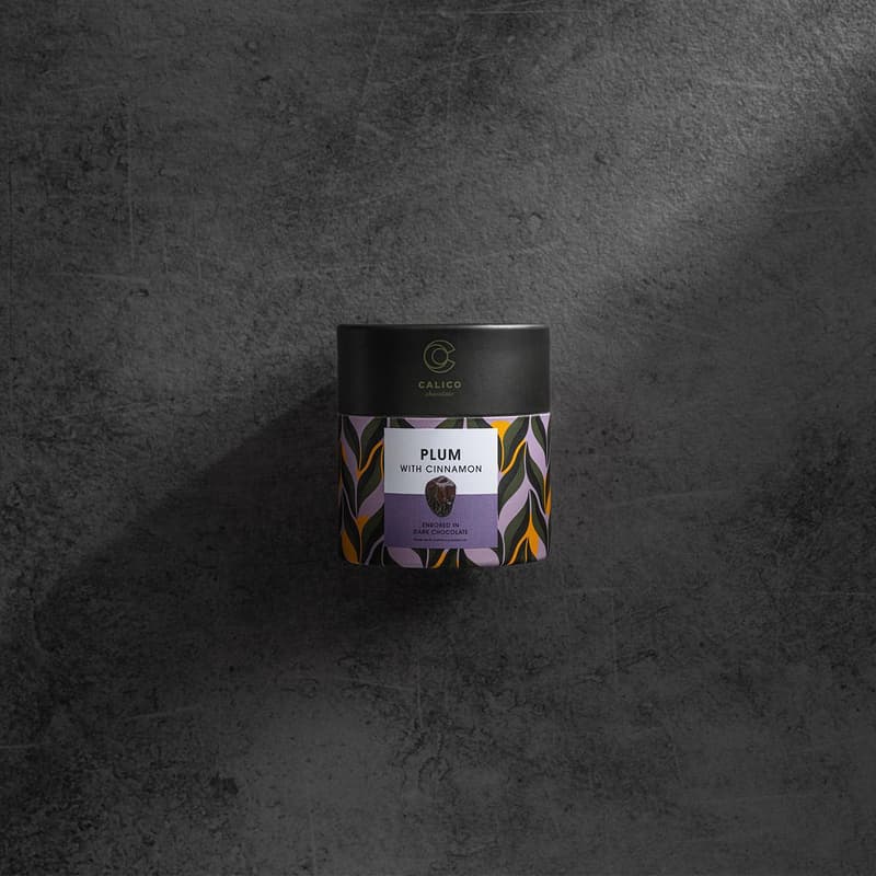 Calico Fruits - Plum with cinnamon, enrobed with dark chocolate