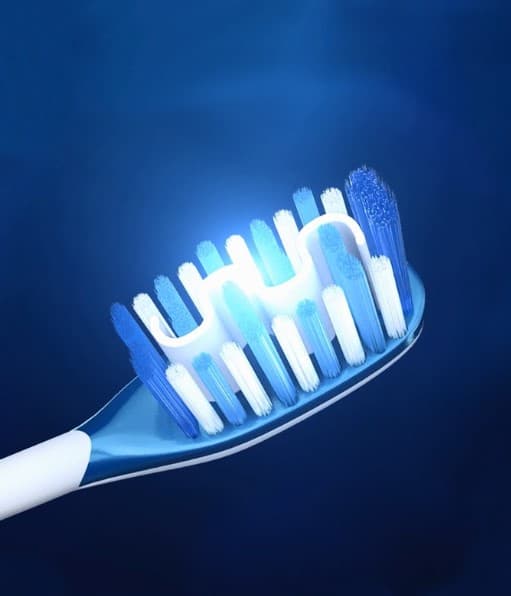 Signal White Now medium hard toothbrush
