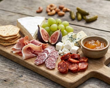 Cold platter with prosciutto ham and figs