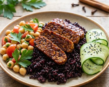 Caramelized tempeh with black rice and chickpeas