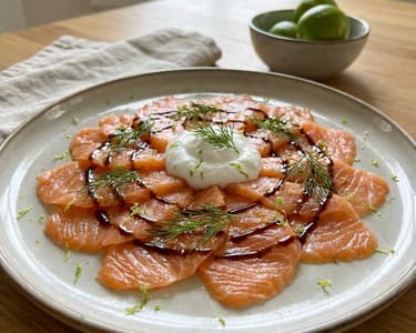 Salmon carpaccio with coconut cream and lime