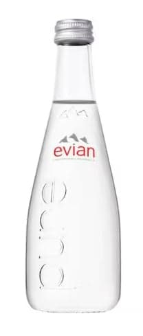 Evian sparkling water in glass bottle